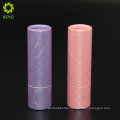 empty cosmetic container round pink violet colored paper lipstick tube